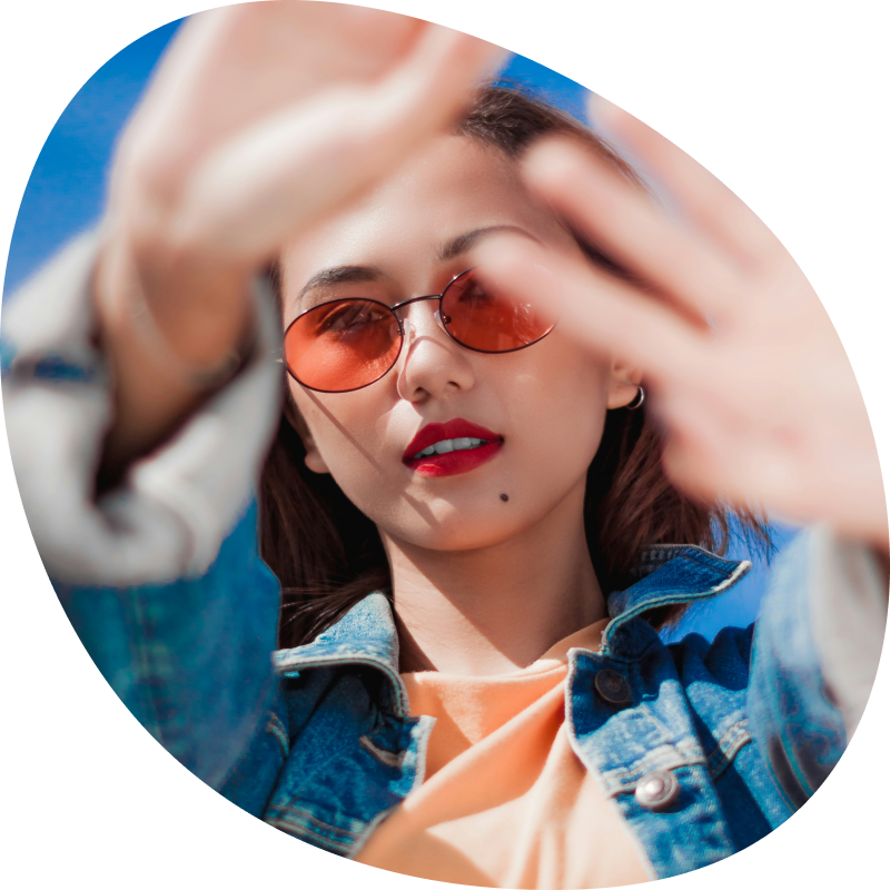 Lady with bright orange glasses